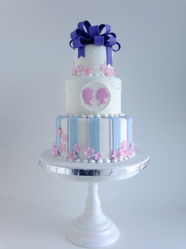 Silhouette bride and groom ribbon bow cake